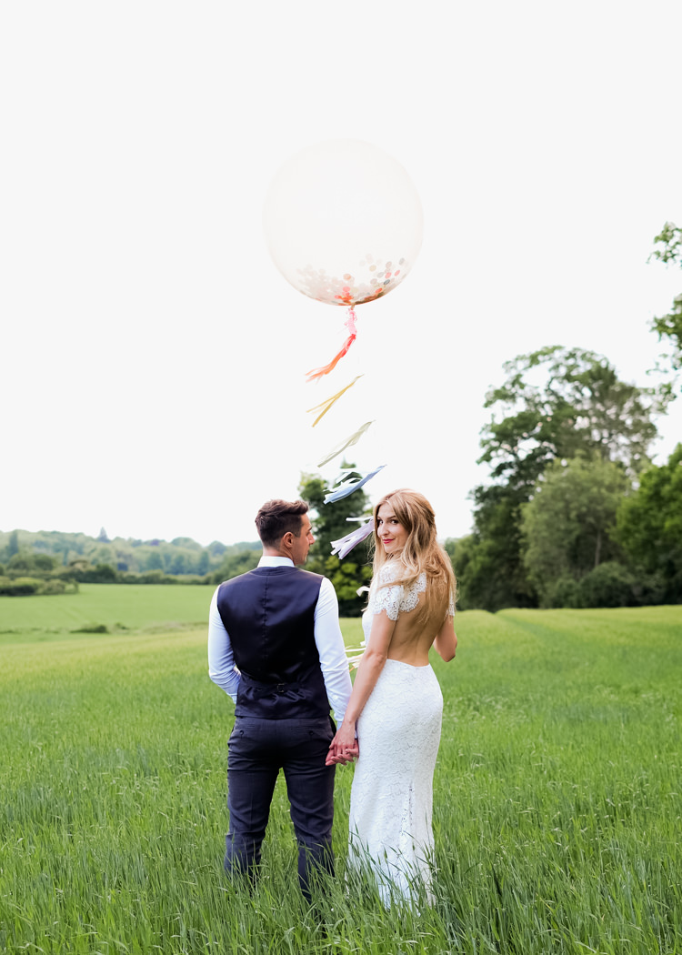 Giant Confetti Tassel Balloon Bride Groom Whimsical Unicorn Rainbow Wedding http://clairemacintyre.com/