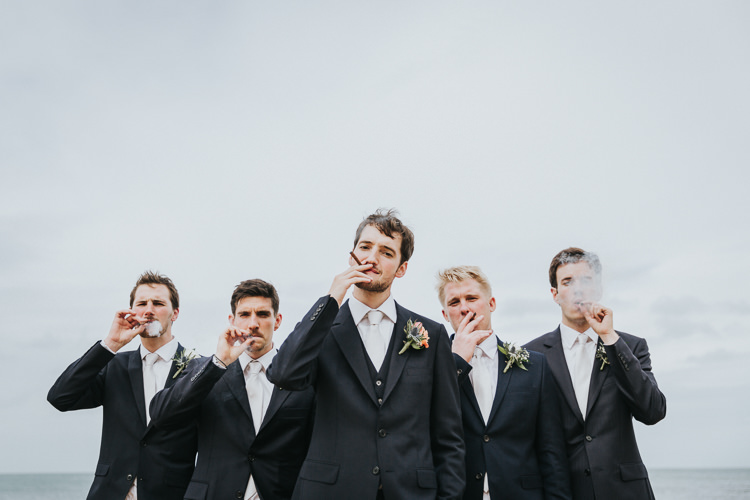 Groom Groomsmen Black Suits White Ties Colour Pop Coral Beach Wedding http://www.kategrayphotography.com/