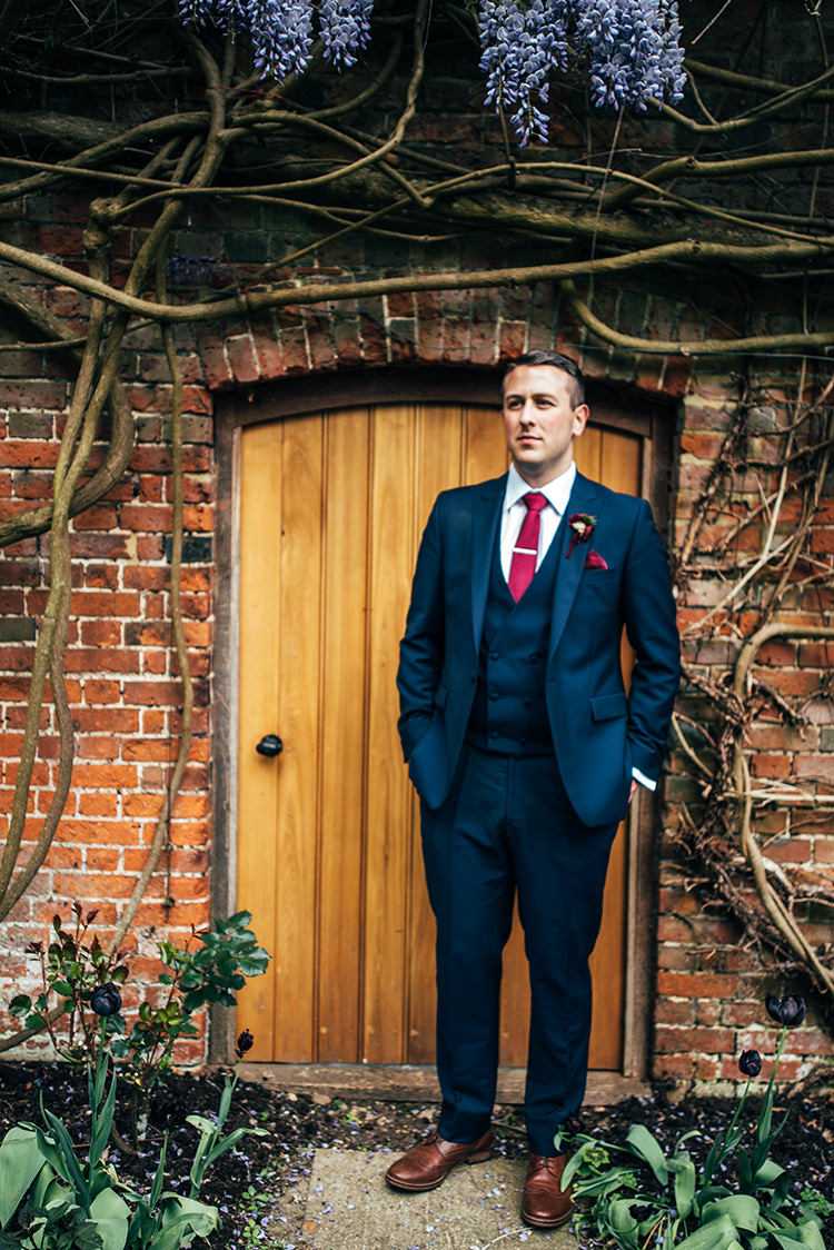 Navy Suit Red Tie Tan Shoes Groom Colourful Hand Made Rustic Barn Flower Filled Wedding http://www.threeflowersphotography.co.uk/