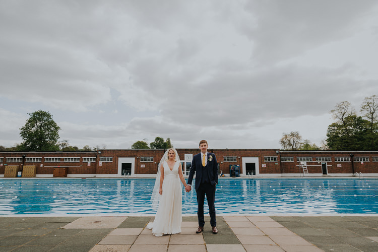 Brockwell Lido Pool Bride Bridal Charlie Brear Dress Gown Veil Edit Suits Groom Yellow Tie Three Piece Waistcoat Low Key Colour Pop Local City Wedding http://www.kategrayphotography.com/