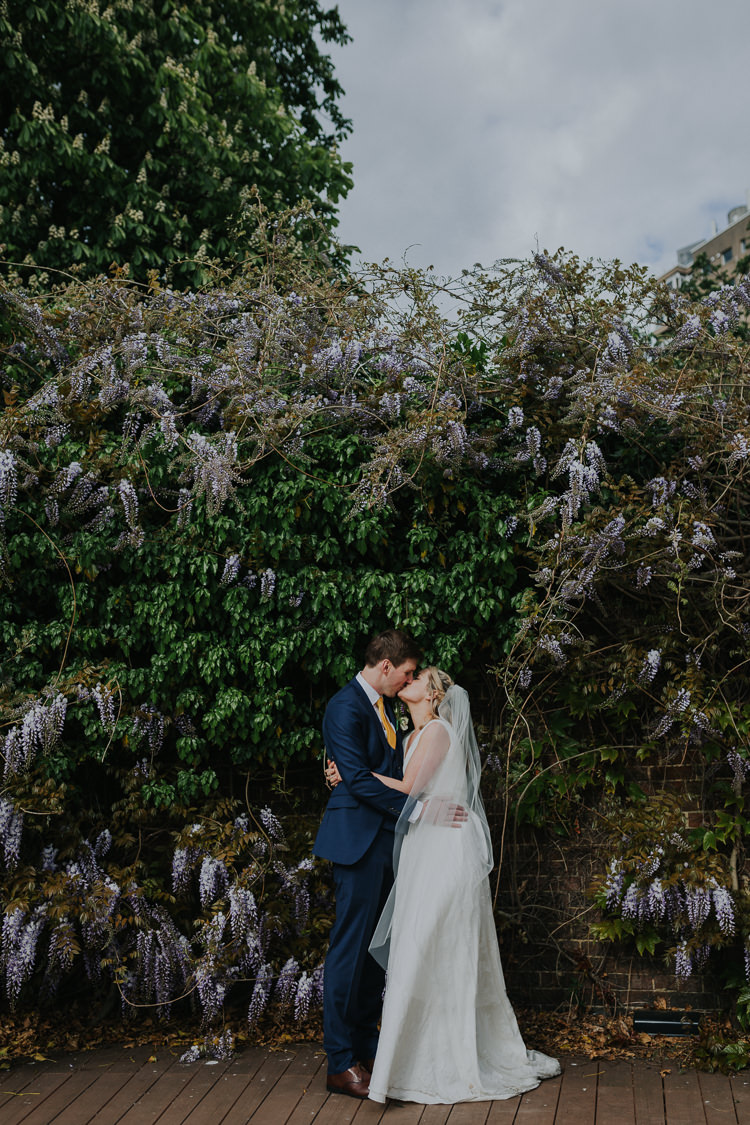 Brockwell Lido Pool Bride Bridal Charlie Brear Dress Gown Veil Edit Suits Groom Yellow Tie Three Piece Waistcoat Low Key Colour Pop Local City Wedding http://www.kategrayphotography.com/