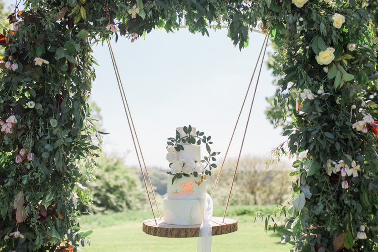 Marble Cake Wreath Gold Log Suspended Log Hanging Swing Flower Arch Bohemian Garden Greenery Wedding Ideas http://www.storytellerphotography.co.uk/