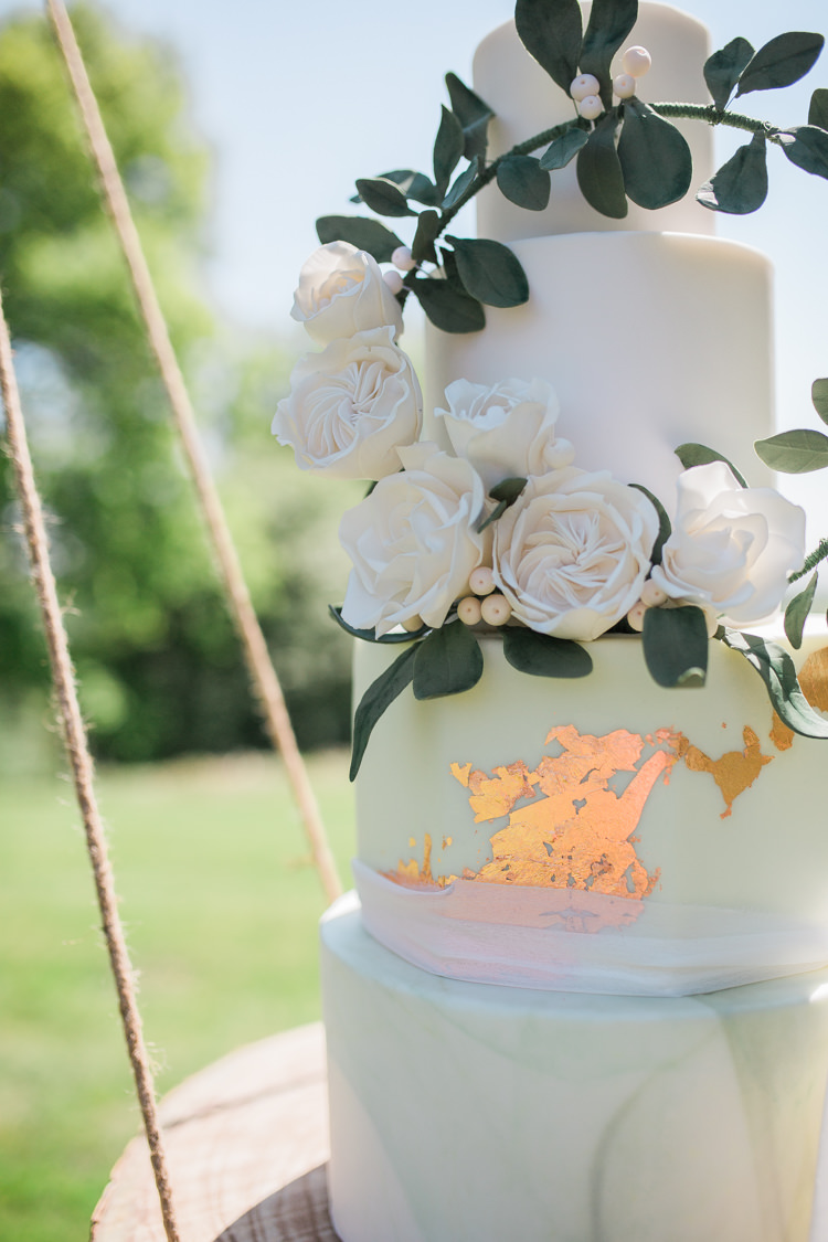 Marble Cake Wreath Gold Log Suspended Log Hanging Swing Bohemian Garden Greenery Wedding Ideas http://www.storytellerphotography.co.uk/