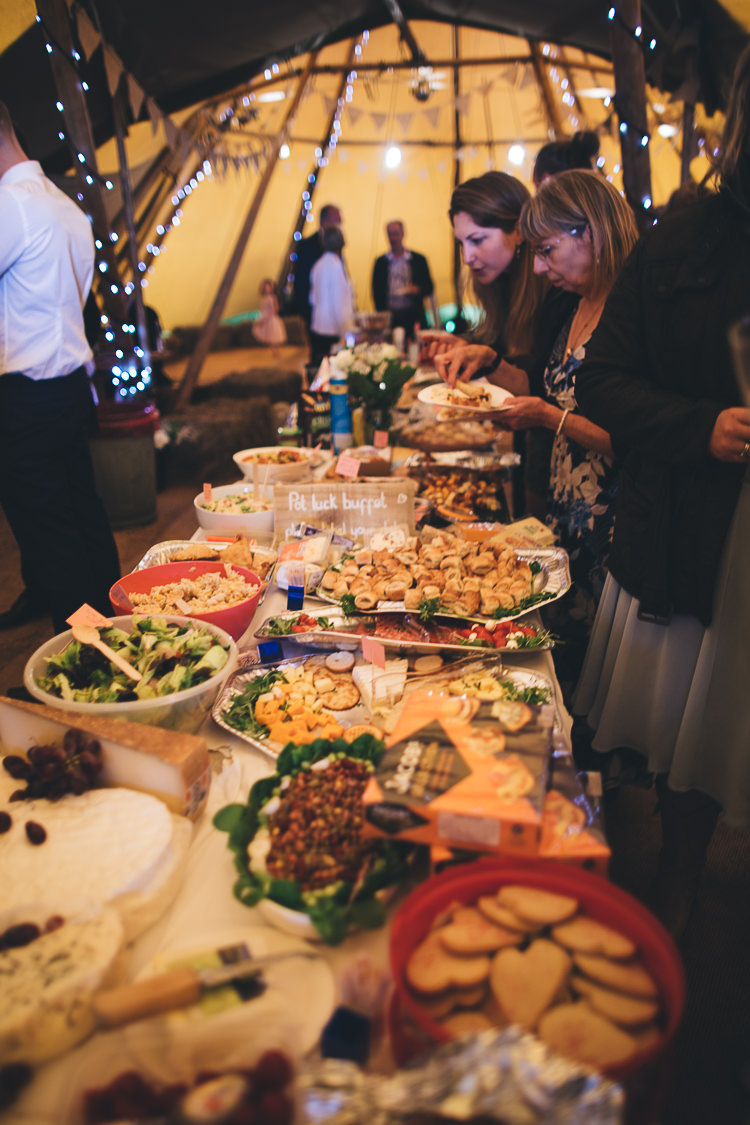 Pot Luck DIY Buffet Large DIY Bohemian Tipi Party Wedding http://www.mikeplunkettphotography.com/