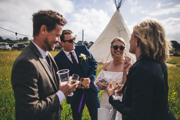Large DIY Bohemian Tipi Party Wedding http://www.mikeplunkettphotography.com/