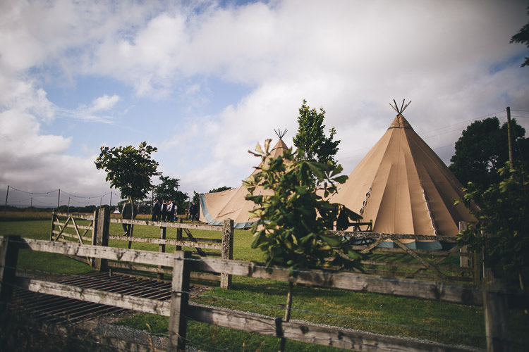 Large DIY Bohemian Tipi Party Wedding http://www.mikeplunkettphotography.com/