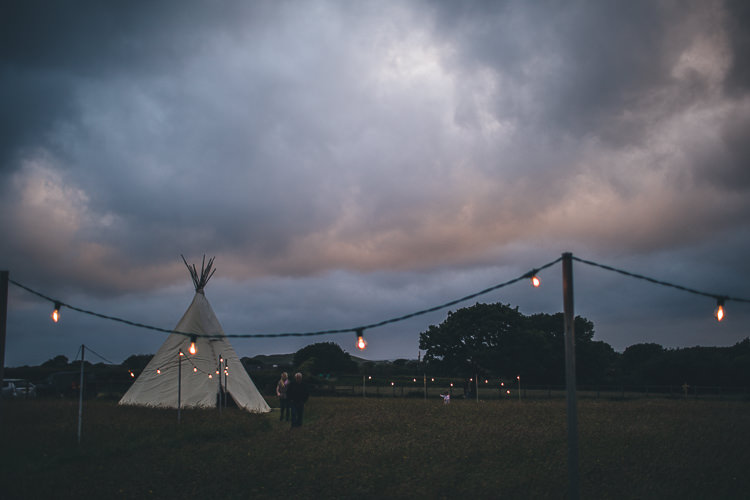 Large DIY Bohemian Tipi Party Wedding http://www.mikeplunkettphotography.com/