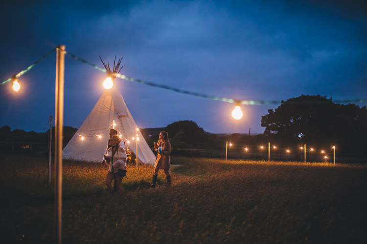 Large DIY Bohemian Tipi Party Wedding http://www.mikeplunkettphotography.com/