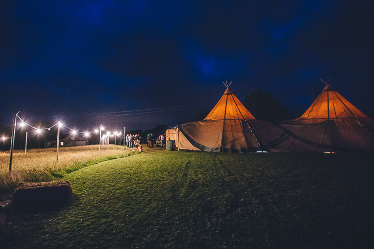 Large DIY Bohemian Tipi Party Wedding http://www.mikeplunkettphotography.com/