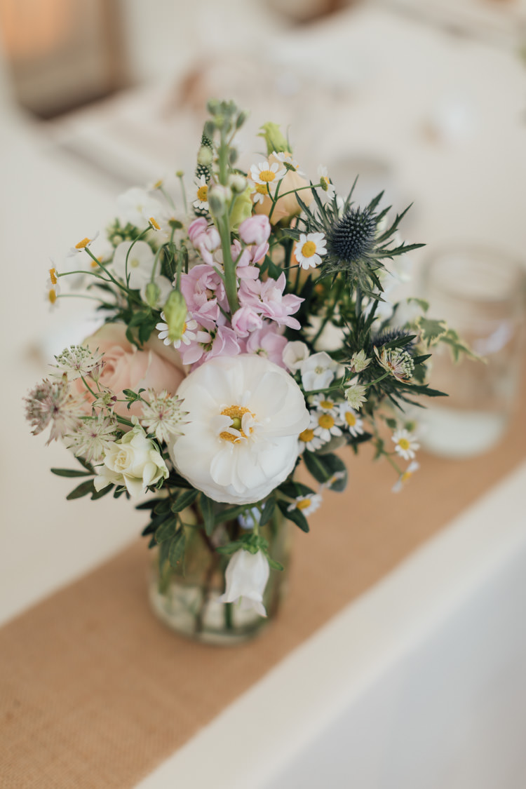 Jar Flowers Centrepiece Daisy Stocks Thisles Pretty Pale Pink Scenic Coast Wedding http://rachellambertphotography.co.uk/