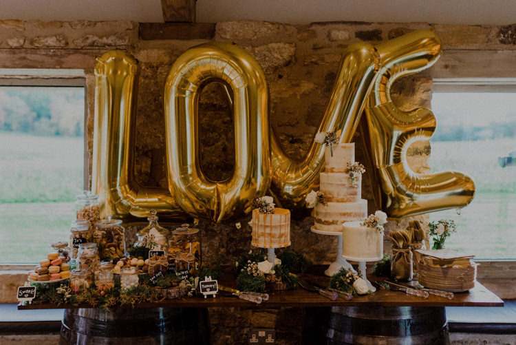 Cake Dessert Table LOVE Balloons Naked Drip Cakes Dreamy Natural Boho Barn Wedding https://heychrisrandle.com/
