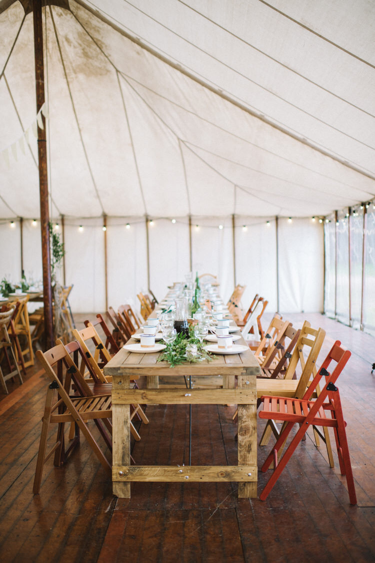 Pole Marquee Festoon Lights Wooden Furniture Chairs Tables Vintage Log Cabin Wedding Sea http://www.lisadevinephotography.co.uk/