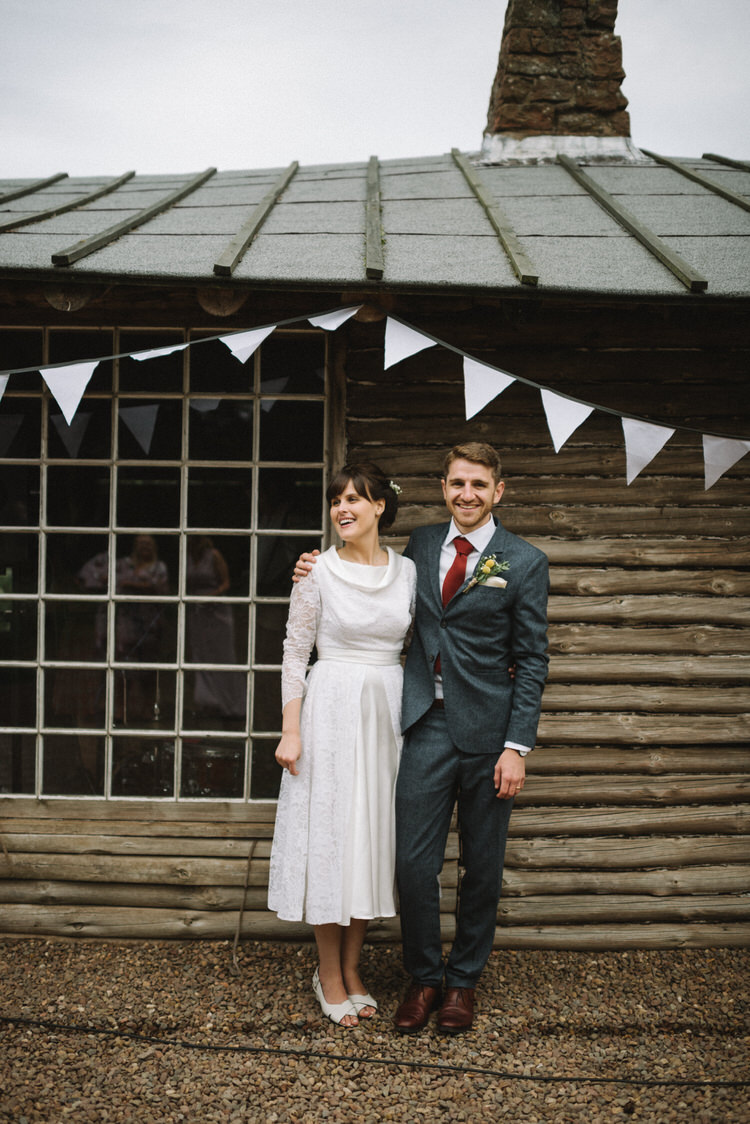 Grey Suit Groom Red Tie 1930s Dress Bride Bridal Short Vintage Log Cabin Wedding Sea http://www.lisadevinephotography.co.uk/
