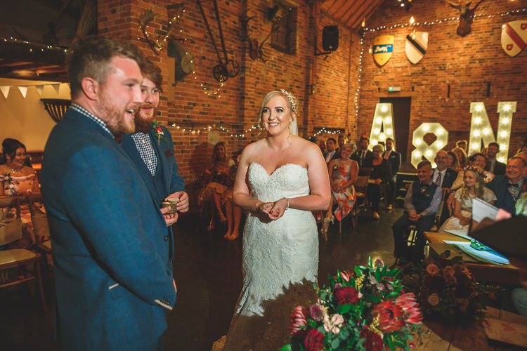 Bride Bridal Sottero & Midgley Sweetheart Neckline Sleeveless Veil Marc Darcy Groom Gingham Shirt Rustic Barn Red Gold Glam Wedding https://garethnewsteadphotography.com/