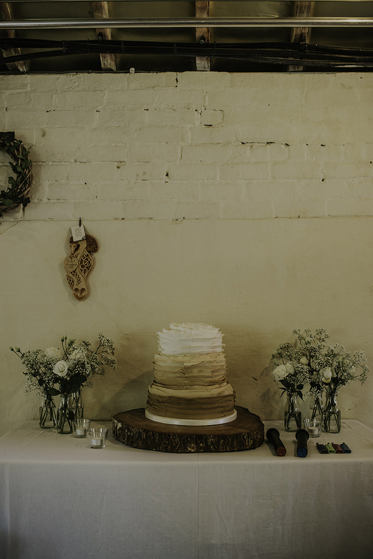 Ruffled Cake Brown White Log Enchanting Country Barn Wedding http://www.dmcclane.com/