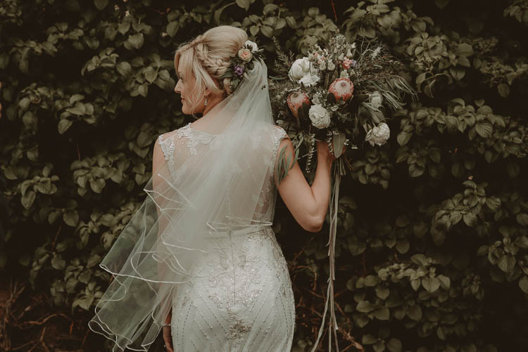 Bouquet Flowers Bride Bridal Protea Ribbons Greenery Foliage Whimsical Modern Rustic Barn Wedding http://photomagician.co.uk/