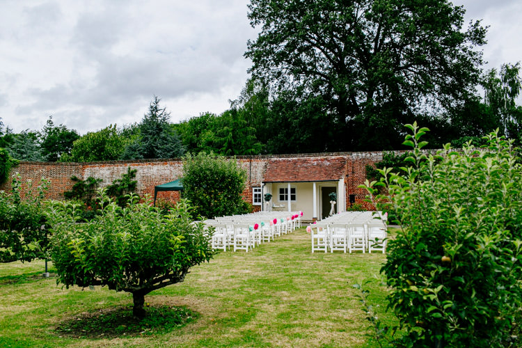 Walled Garden Outdoor Ceremony Chiavari Chairs Stylish Sassy Gin Wedding http://epiclovestory.co.uk/