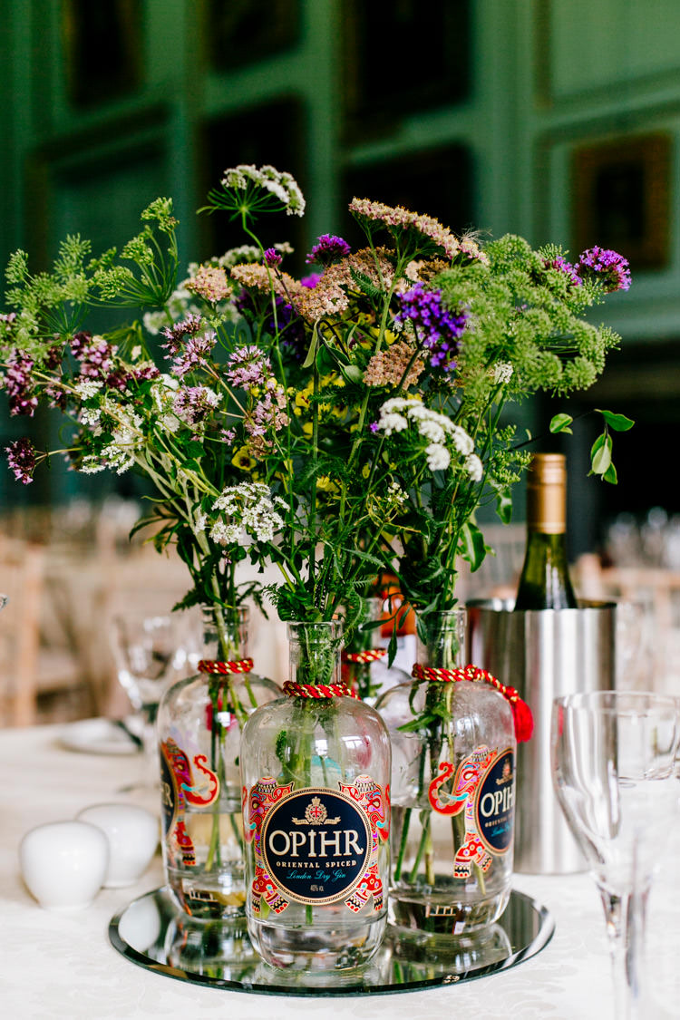 Opihr Centre Piece Bottle Flowers Floral Mirror Centre Table Stylish Sassy Gin Wedding http://epiclovestory.co.uk/