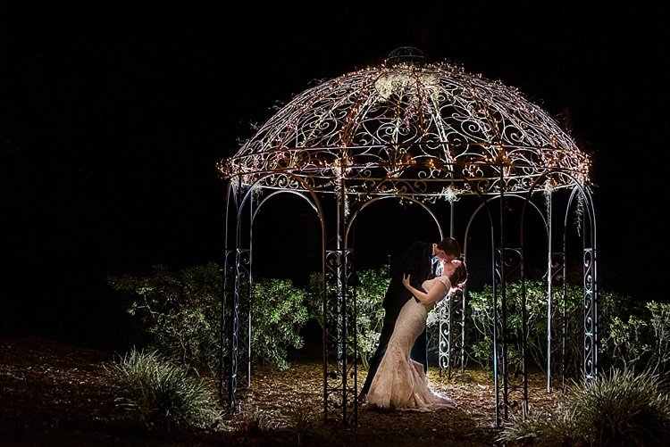 Pavilion Lights Kiss Bride Groom Romantic Twinkling Garden Wedding http://sarahben.com/