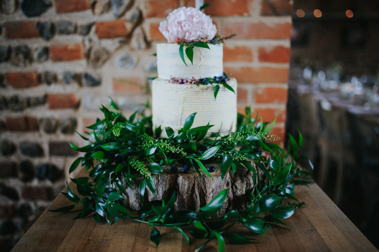 Buttercream Cake Log Stand Greenery Foliage Peony Ethereal Alternative Country Barn Wedding Dark Moody Sky http://joshuapatrickphotography.com/