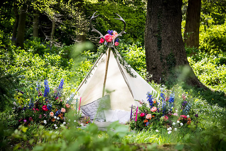 Tipi Tent Her Heart Was A Secret Garden Wedding Ideas Woodland Colourful Spring Bluebells Flowers http://sarabeaumontphotography.com/