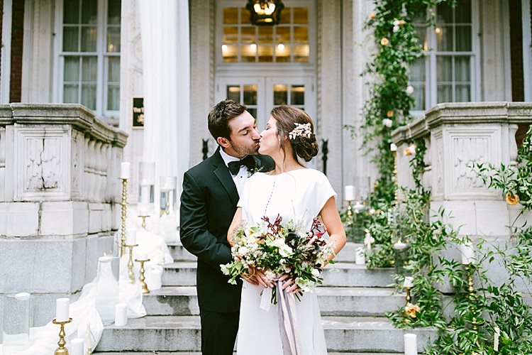 Black Tie Groom Bride Short Sleeve Plain Dress Buttons Long Veil Up Do Gold Tiara Headpiece Bouquet Roses Greenery Kiss Modern Elegance Marble Greenery Gold Wedding Ideas http://www.jettwalkerphotography.com/