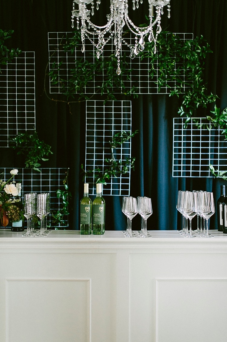 Chandelier Glassware Bottles Wine Drinks Bar Modern Elegance Marble Greenery Gold Wedding Ideas http://www.jettwalkerphotography.com/