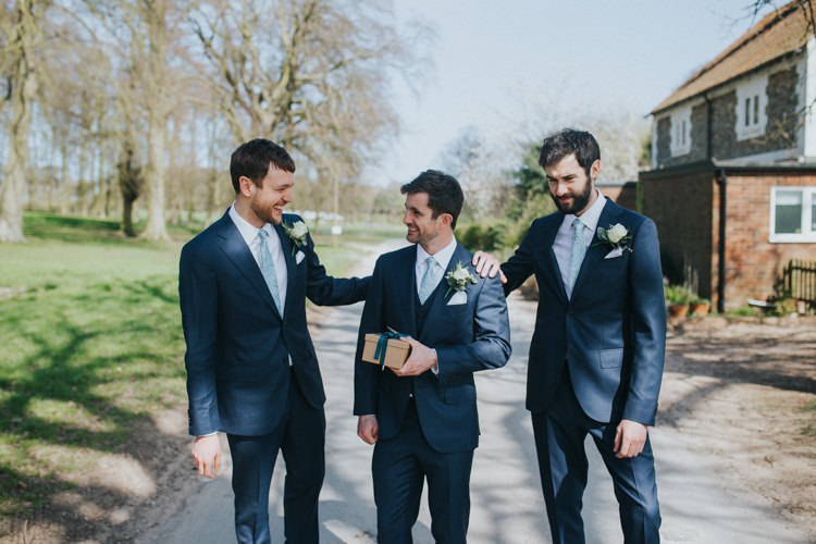 Groom Groomsmen Suit Supply Navy Blue Beautifully Serene Beachside Barn Wedding https://joshuapatrickphotography.com/