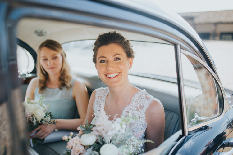 Suzanne Neville Bride Bridal Lace Sleeveless V Neck Vintage Car Beautifully Serene Beachside Barn Wedding https://joshuapatrickphotography.com/
