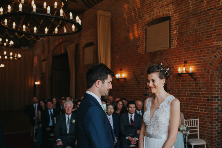Bride Bridal Suzanne Neville Lace Top V Neck Sleeveless Ribbon Belt Suit Supply Groom Beautifully Serene Beachside Barn Wedding https://joshuapatrickphotography.com/