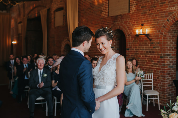 Bride Bridal Suzanne Neville Lace Top V Neck Sleeveless Ribbon Belt Suit Supply Groom Beautifully Serene Beachside Barn Wedding https://joshuapatrickphotography.com/