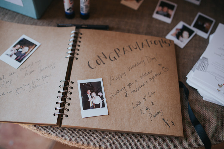 Guest Book Polaroid Burlap Hessian Table Beautifully Serene Beachside Barn Wedding https://joshuapatrickphotography.com/