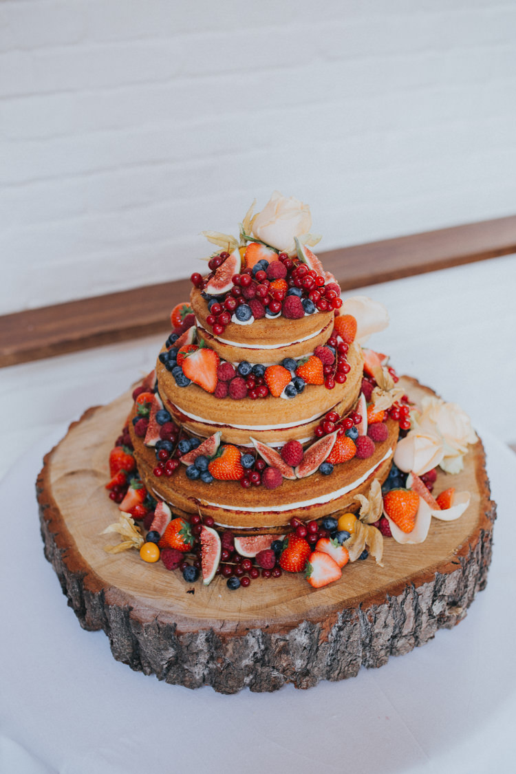 Naked Cake Fruit Berries Log Slice Stand Wood Beautifully Serene Beachside Barn Wedding https://joshuapatrickphotography.com/