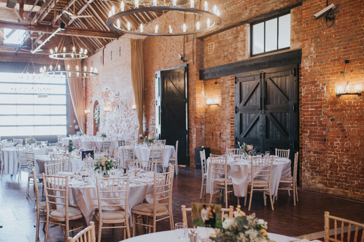 Barn Chiavari Chairs Blush Tables Flowers Beautifully Serene Beachside Barn Wedding https://joshuapatrickphotography.com/