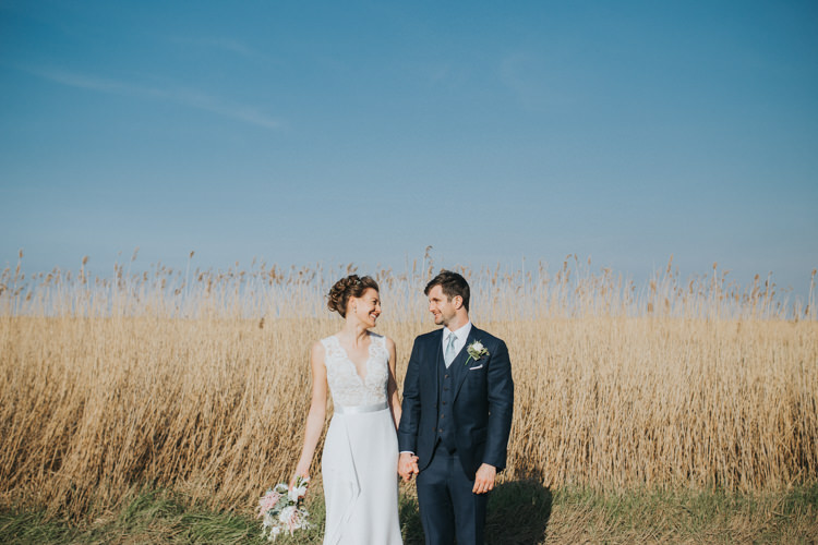 Bride Bridal Suzanne Neville Dress Gown Lace V Neck Suit Supply Groom Beautifully Serene Beachside Barn Wedding https://joshuapatrickphotography.com/