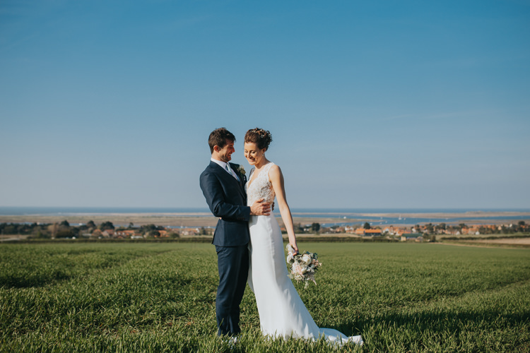 Bride Bridal Suzanne Neville Dress Gown Lace V Neck Suit Supply Groom Beautifully Serene Beachside Barn Wedding https://joshuapatrickphotography.com/