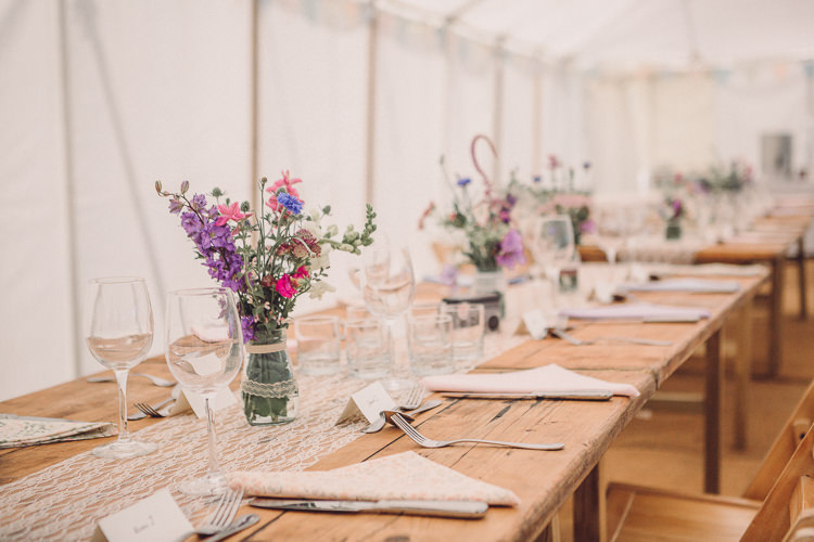 Rustic Tables Setting Wooden Wildflowers Jam Jars Lace Runner Relaxed Outdoor Marquee Farm Wedding http://www.jenniferjanephotography.co.uk/