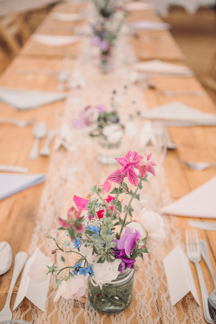 Rustic Tables Setting Wooden Wildflowers Jam Jars Lace Runner Relaxed Outdoor Marquee Farm Wedding http://www.jenniferjanephotography.co.uk/