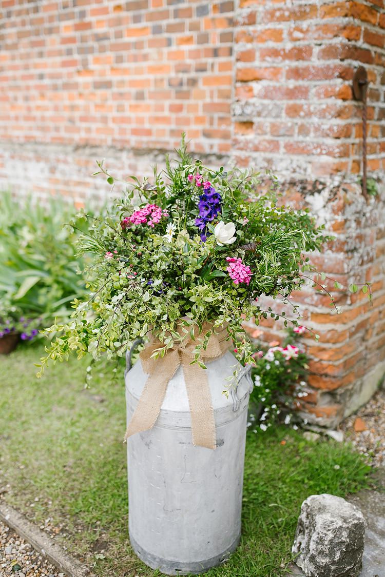 Milk Churn Flowers Hessian Bow Graceful Country Cottage Garden Wedding https://katherineashdown.co.uk/