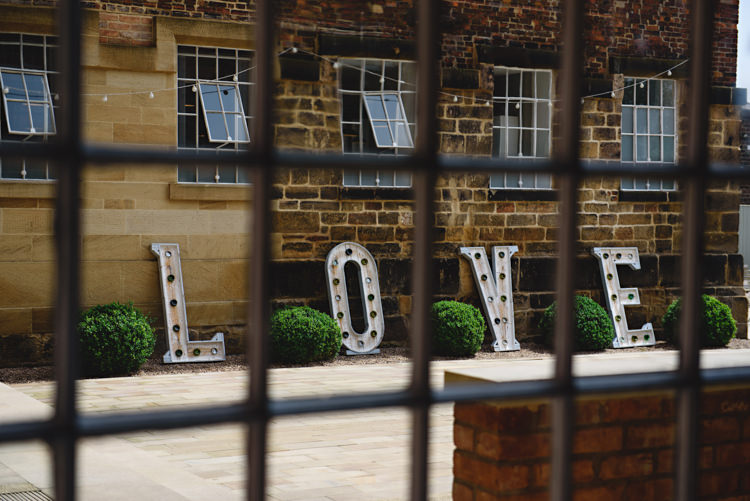LOVE Letter Lights Industrial Rose Gold Dove Grey Greenery Wedding http://hbaphotography.com/