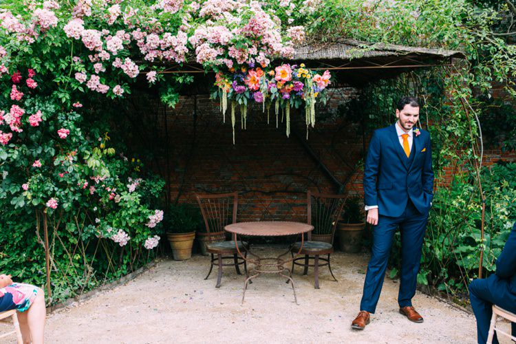 Navy Suit Yellow Orange Tie Groom Colourful Mexican Garden Wedding http://jennifersmithphotography.co.uk/