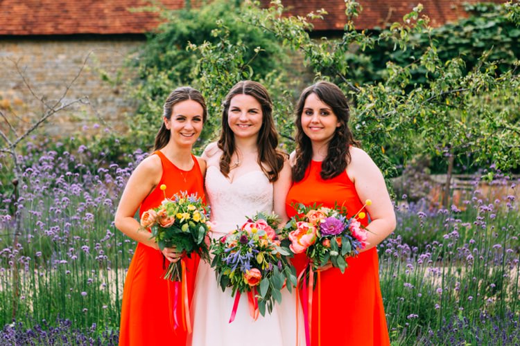 Coral Red Bridesmaid Dresses Colourful Mexican Garden Wedding http://jennifersmithphotography.co.uk/