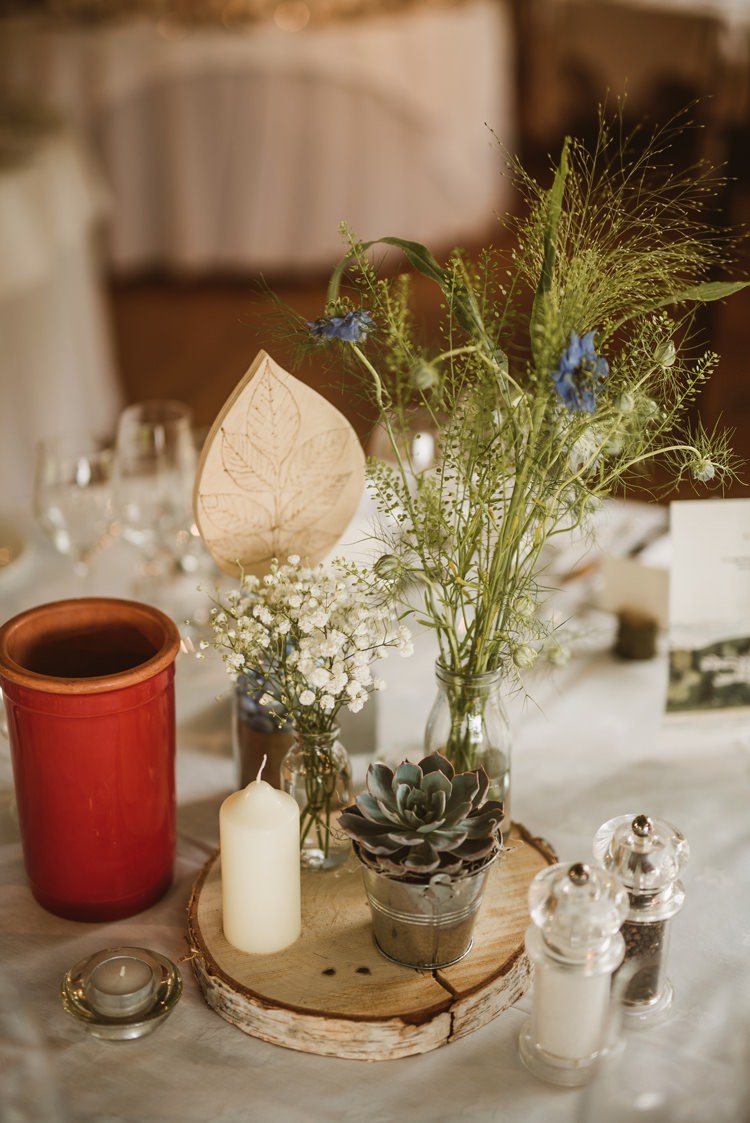 Flowers Bottles Log Centrepiece Decor Table Succulent Homely Ethereal Intimate Country House Wedding https://www.photosligo.com/