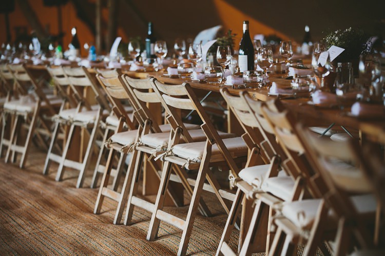 Rustic Wooden Chairs Folding Tables DIY Pretty Pastel Tipi Wales Wedding http://www.mckinley-rodgers.co.uk/