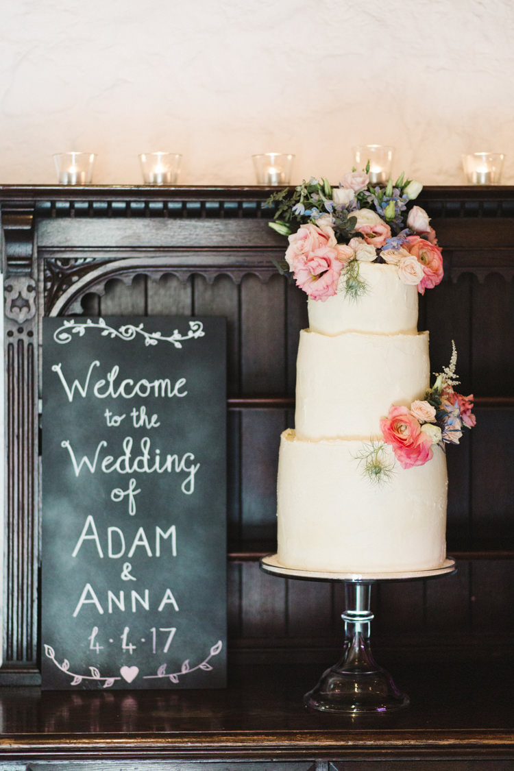 Buttercream Cake Flowers Welcome Sign Black Chalk Board The Prettiest Spring Barn Pastels Wedding https://www.thegibsonsphotography.co.uk/