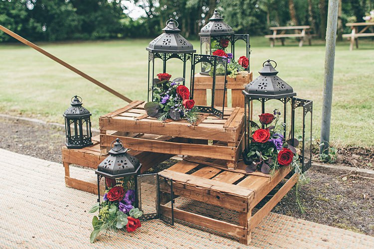 Crates Decor Flowers Lanterns Beautiful Floral Bohemian Garden Wedding http://rachellambertphotography.co.uk/