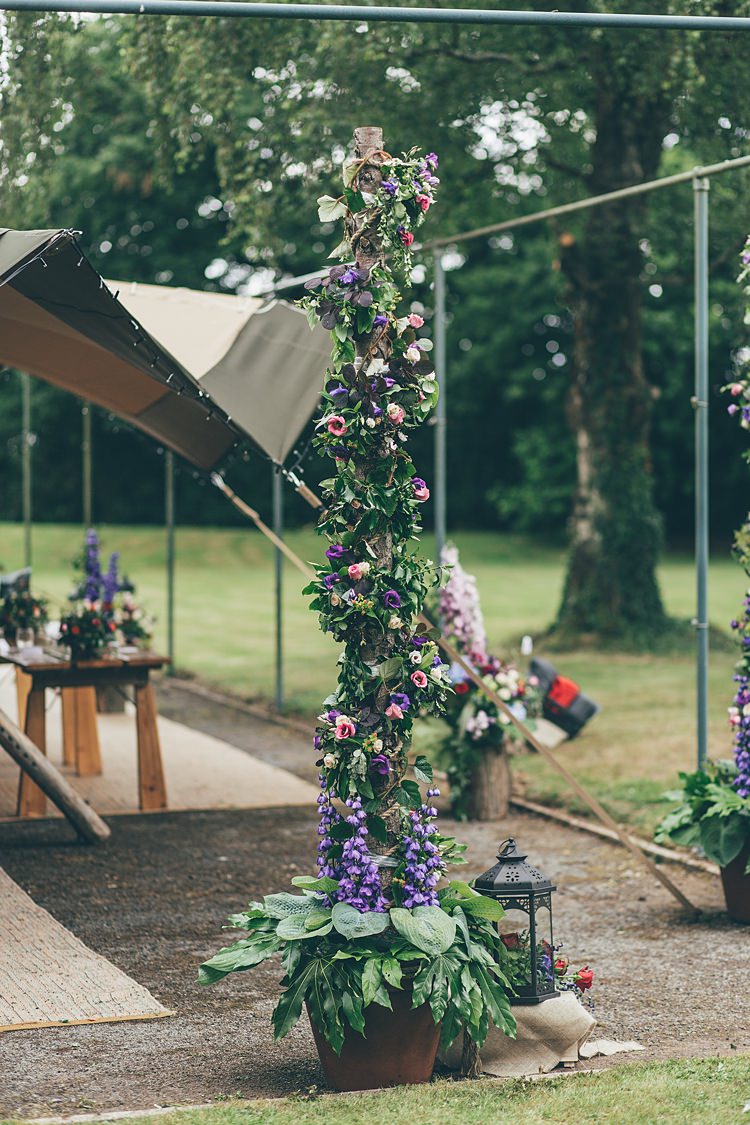 Flower Tree Pole Log Purple Red Pink Beautiful Floral Bohemian Garden Wedding http://rachellambertphotography.co.uk/