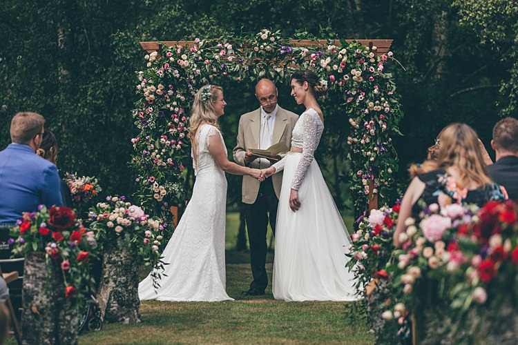 Outdoor Ceremony Flower Arch Backdrop Beautiful Floral Bohemian Garden Wedding http://rachellambertphotography.co.uk/