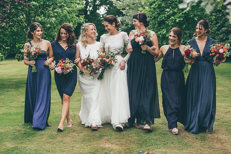 Navy Blue Mismatched Bridesmaid Dresses Beautiful Floral Bohemian Garden Wedding http://rachellambertphotography.co.uk/