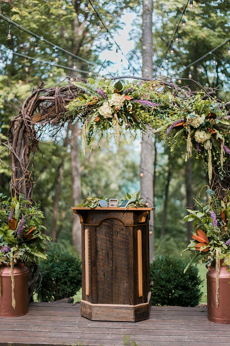 Wooden Pew Branches Foliage Outdoor Ceremony Pew Wooden Platform Whimsical Woods Wedding Barn Ohio http://www.connectionphotoblog.com/